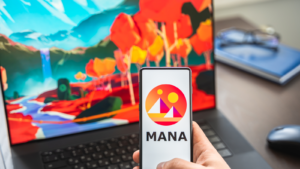 Screenshot of blockchain nft ethereum cryptocurrency game Decentraland (MANA) logo on laptop, mobile phone