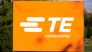 The logo for TE Connectivity (TEL) is seen on a sign.
