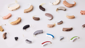 Various hearing aids on a white background representing EAR stock.