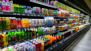 A grocery store containing various drinks.