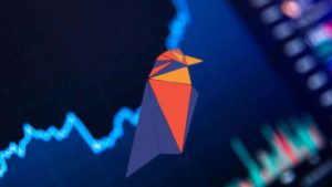 The logo for Ravencoin (RVN) displayed on a trading chart.