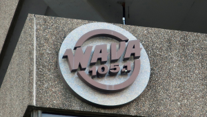 WAVA 105.1 sign on building exterior. WAVA 105.1 is a commercial radio station owned by Salem Media Group (SALM), a media company focusing on Christian and conservative communities.