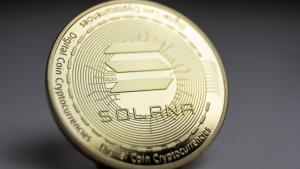 Macro shot of a physical coin from the cryptocurrency Solana (<a rel=