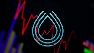 The logo of the Serum (SRM) crypto displayed on a trading chart.