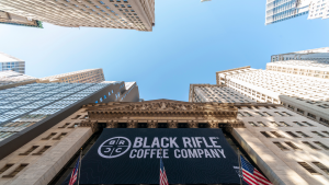 The facade of the New York Stock Exchange is decorated for listing via a Black Rifle Coffee Company (BRCC) SPAC
