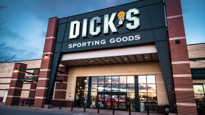Exterior of Dick's Sporting Goods retail store, including sign and logo.