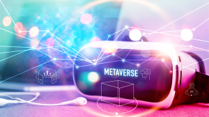 An image of a VR headset and headphones; the word metaverse on the headset. metaverse cryptos