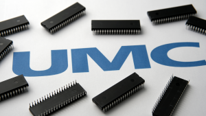 Semiconductor chips and blurred UMC United Microelectronics Corporation logo.