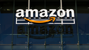 Closeup of the Amazon logo at the Amazon campus in Palo Alto, California.  The Palo Alto location hosts the A9 Search, Amazon Web Services, and Amazon Game Studios teams.  AMZN Stock