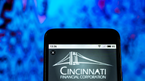The logo for Cincinnati Financial is shown on a cellphone screen.