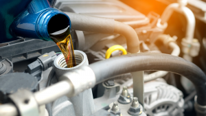 wes stock image of fuel being poured into a vehicle fuel system