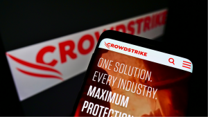 The website of the American software company CrowdStrike Holdings (CRWD) Inc. is displayed on the mobile phone screen. Focus on the top center of your phone's display. Unedited photo.