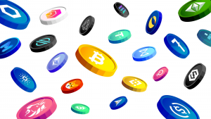 An image of different coins with cryptocurrency logos on them