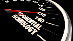 An image of a speedometer with the words "exponential technology" at the maximum