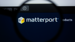 Illustrative editorial of the Matterport (MTTR) website homepage.  MATTERPORT logo visible on display screen.