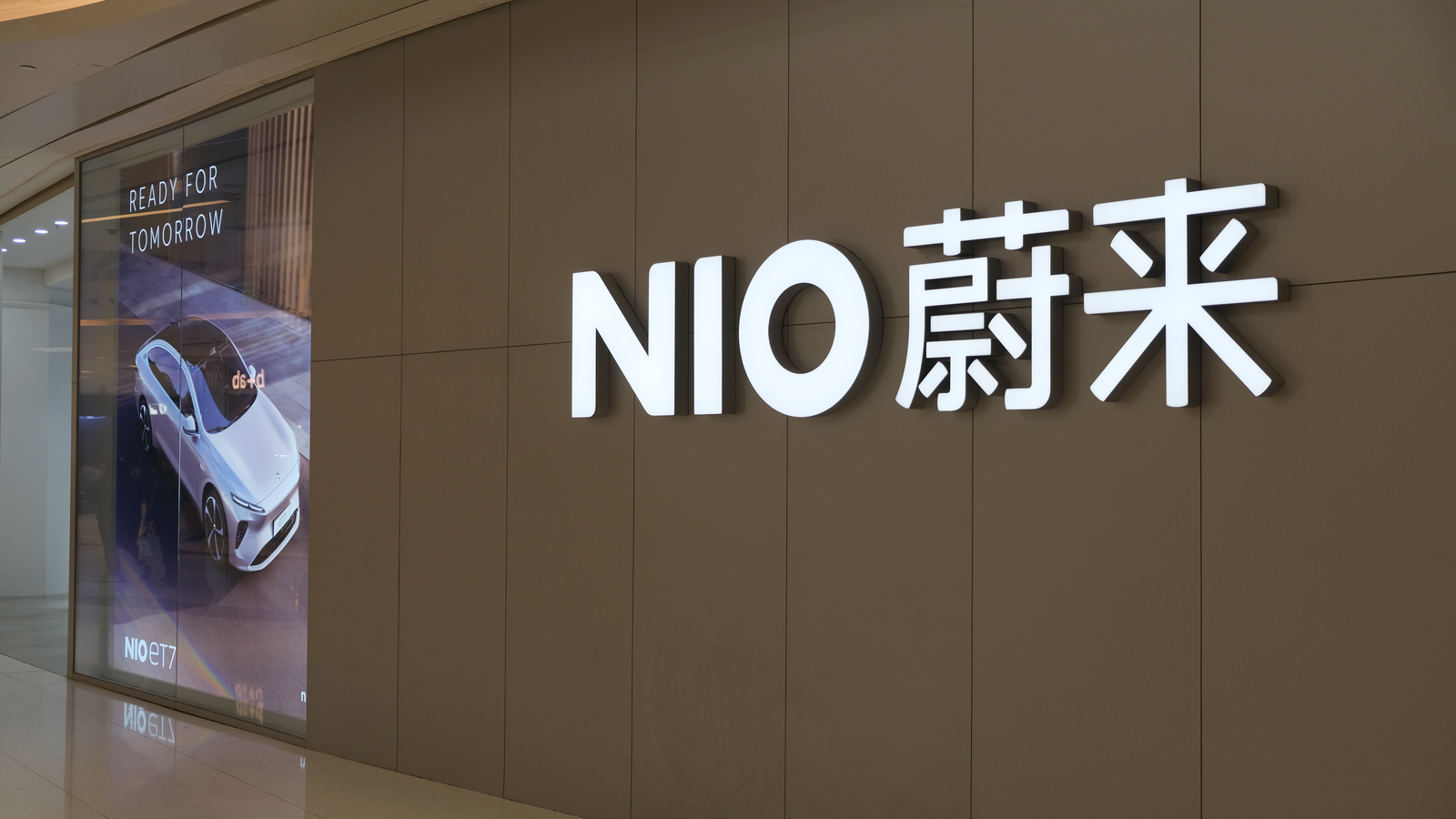 A large NIO store sign and Chinese brand name. NIO is a Chinese EV company
