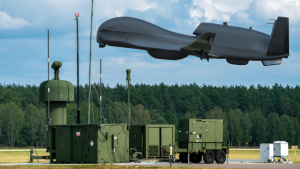 Szczecin, Poland – January 2022: Northrop Grumman RQ-4 Global Hawk takes off from an airfield equipped with drone control equipment. 3D illustration.