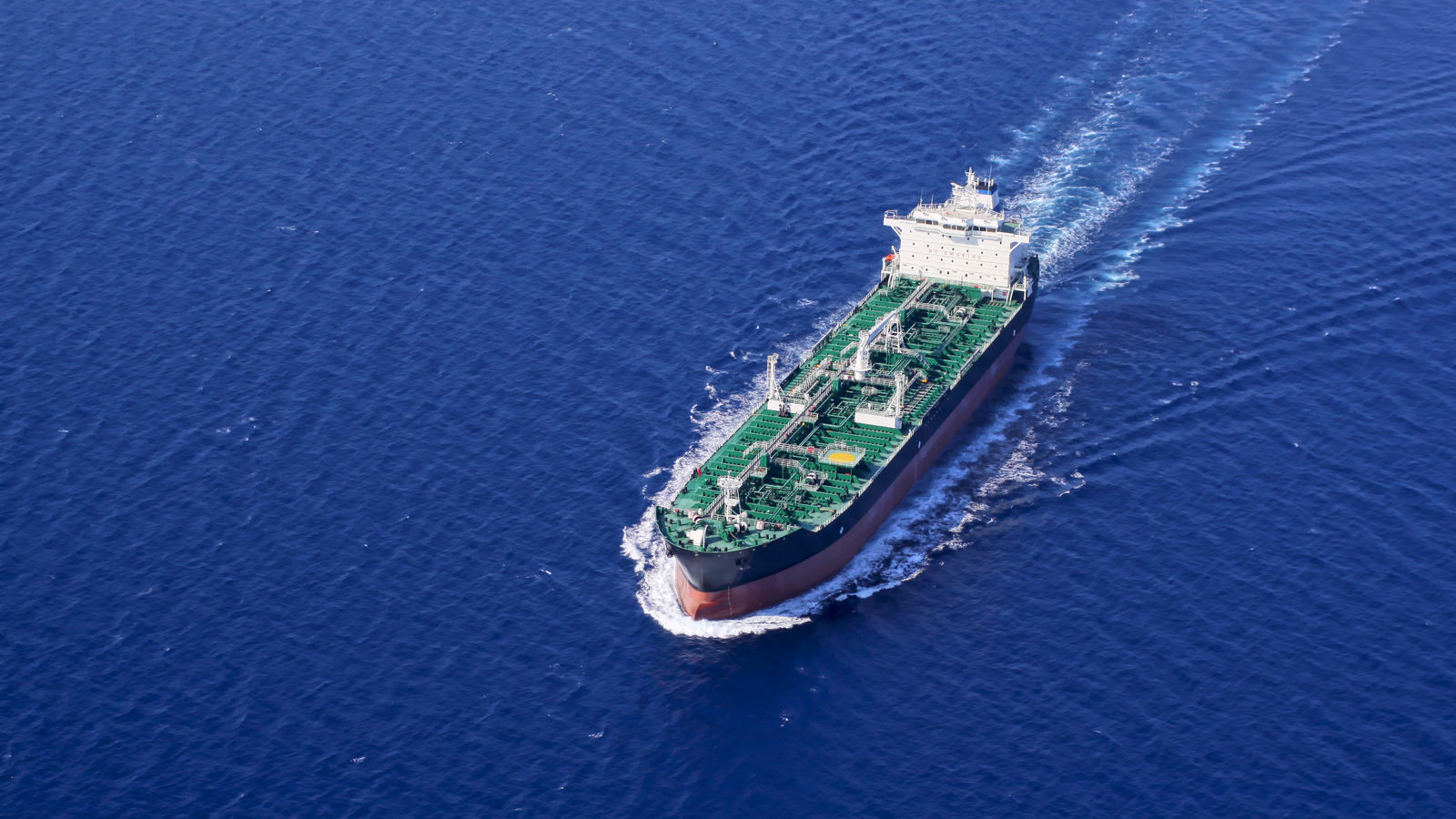 Aerial front side view of oil tanker ship sailing on open sea, Imperial Petroleum (IMPP stock) operates oil tankers