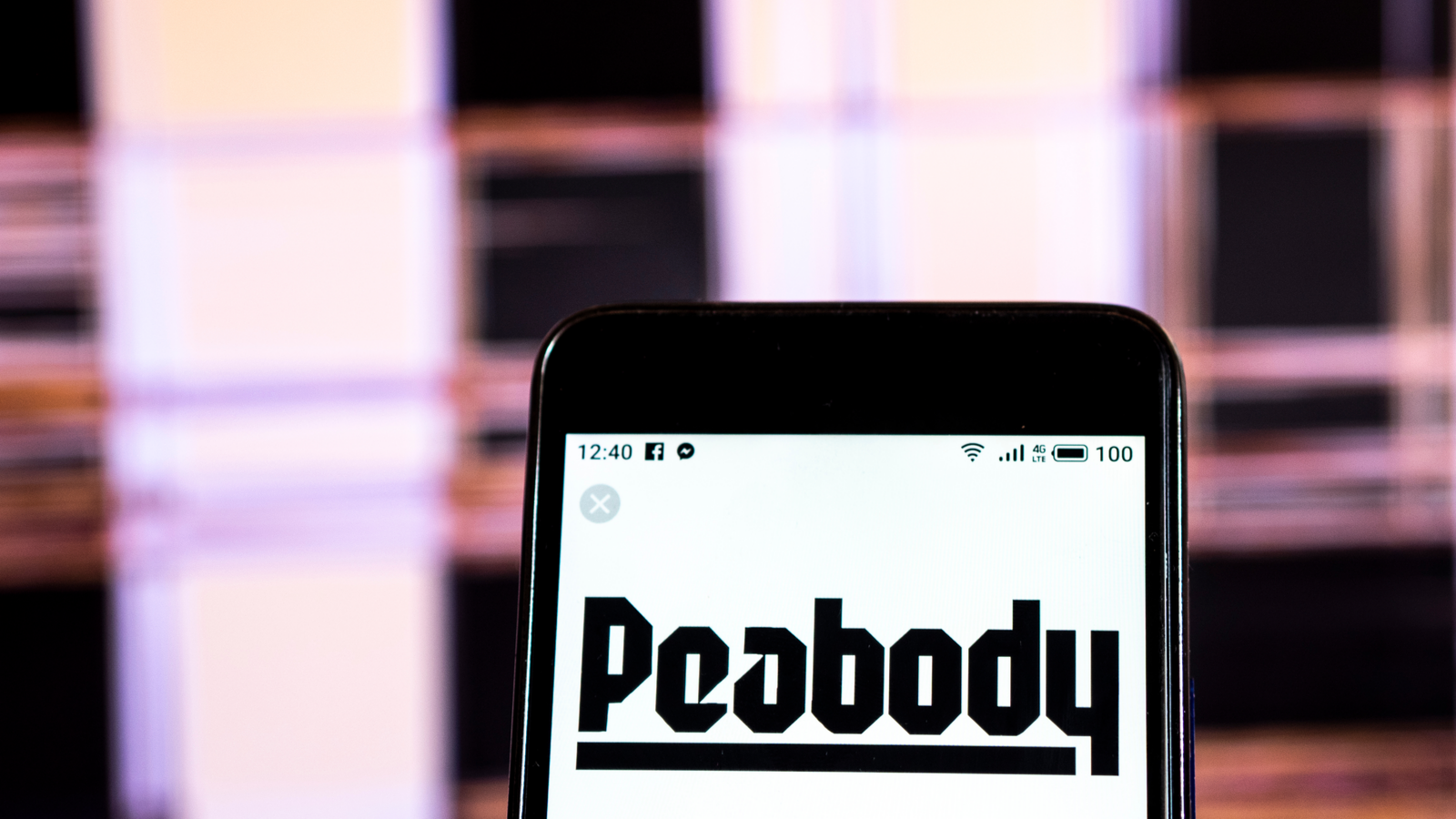 Peabody Energy (BTU) coal mining company logo seen displayed on smart phone