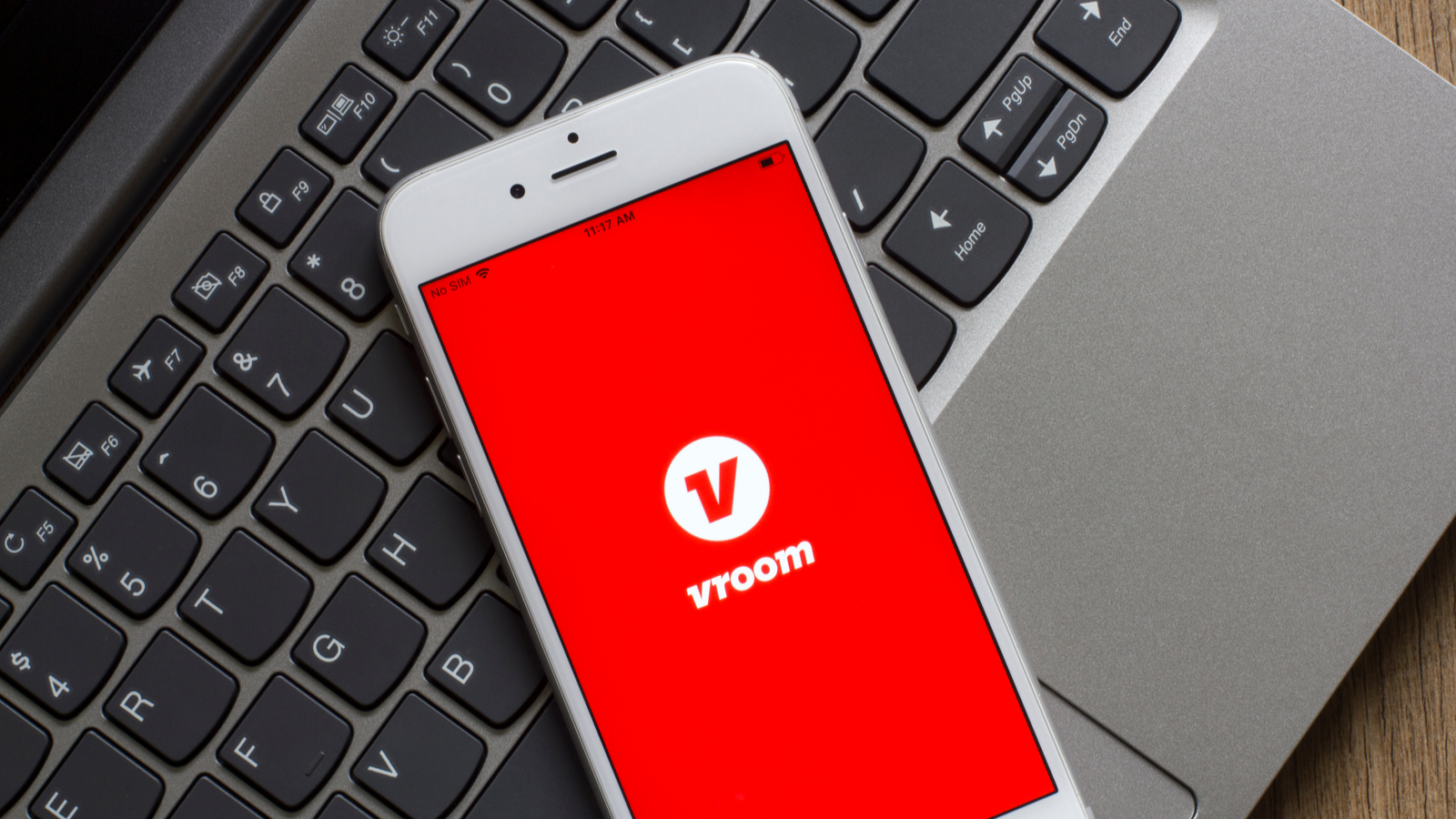 American on-demand car buying and selling startup Vroom's (VRM stock) mobile app welcome page is seen on a smartphone.
