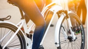 A person is riding an electric bike.