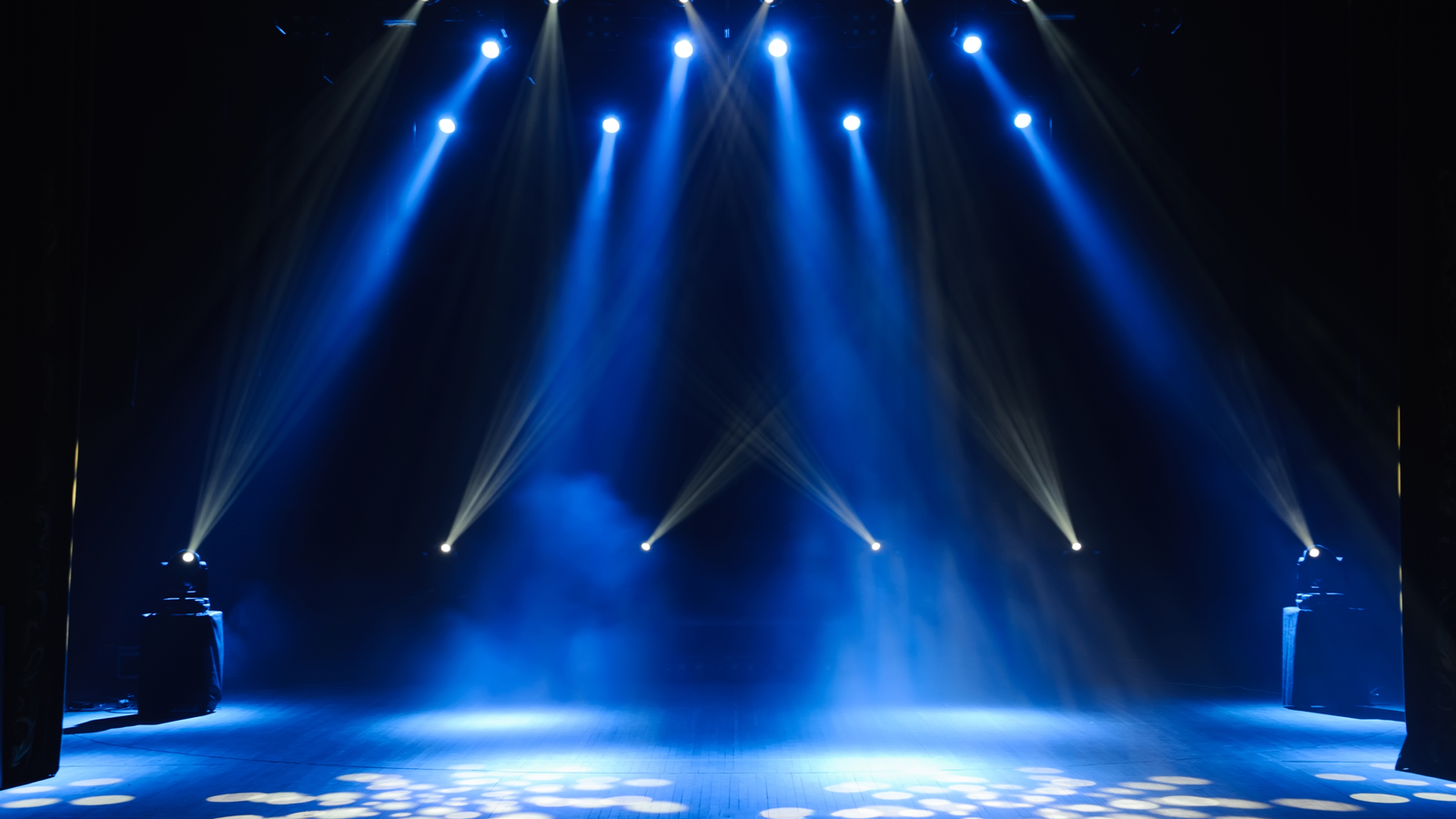 Free stage with lights, lighting devices. Gloomy entertainment stocks