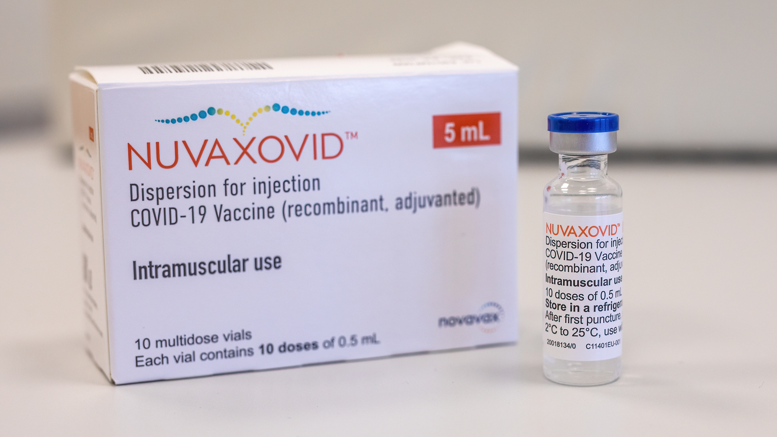 Novavax (NVAX) Covid-19 vaccine Nuvaxovid; Original vaccine vial standing right next to the box in front of white background
