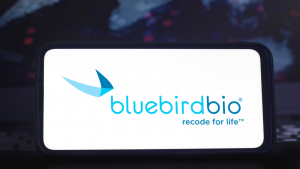 Bluebird Bio biotech company logo on phone screen. BLUE stock.