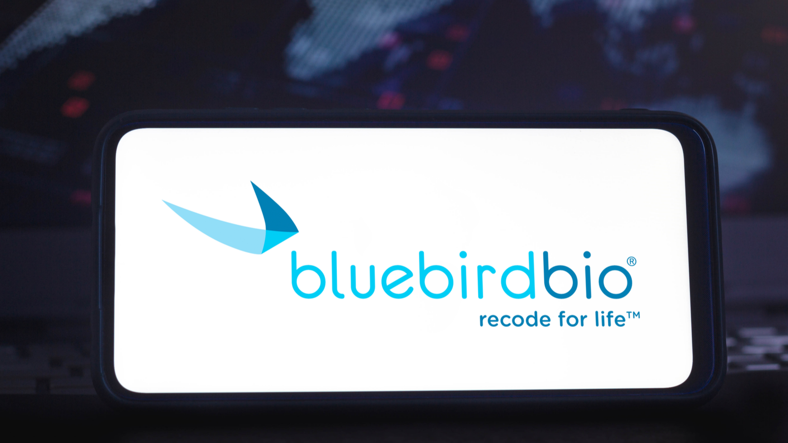 Bluebird Bio biotech company logo on phone screen. BLUE stock.