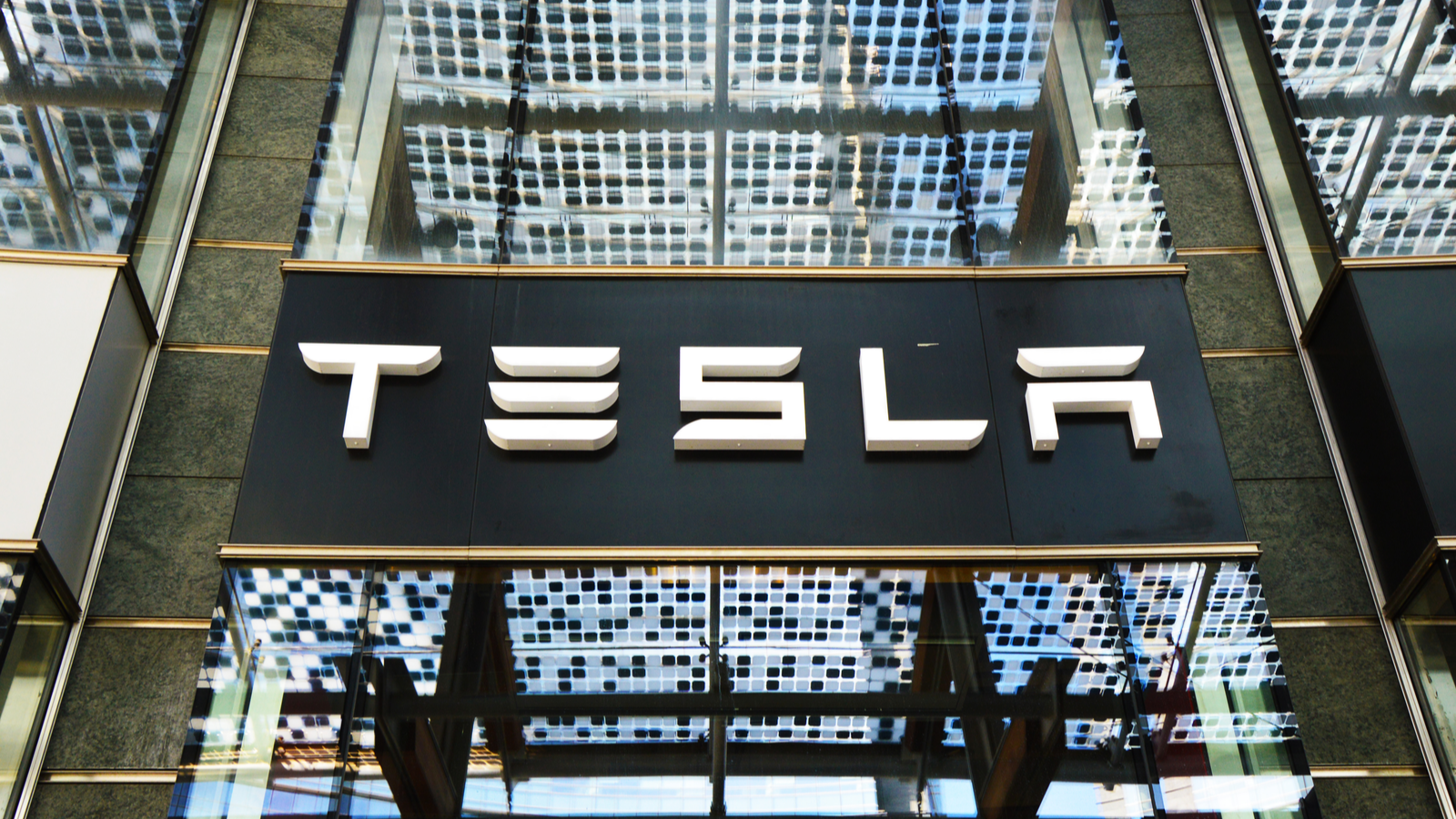 Tesla (TSLA stock) Motors store in Piazza Gae Aulenti square in Milan, Italy