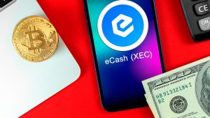 The eCash (XEC) logo on an iPhone screen with cash and a Bitcoin (BTC) coin laying next to it.