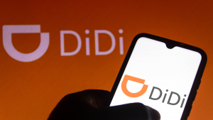 In this photo illustration the Didi Chuxing logo seen displayed on a smartphone. DIDI is now traded as DIDIY stock.
