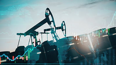 oil pumps and oil barrels with world map and financial chart graphs