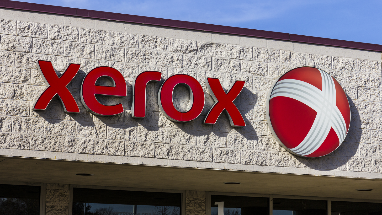 XRX Stock. A photo of the Xerox logo on a storefront. 