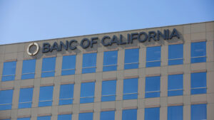 Photo of the Banc of California logo on the building.  Action BENCH.