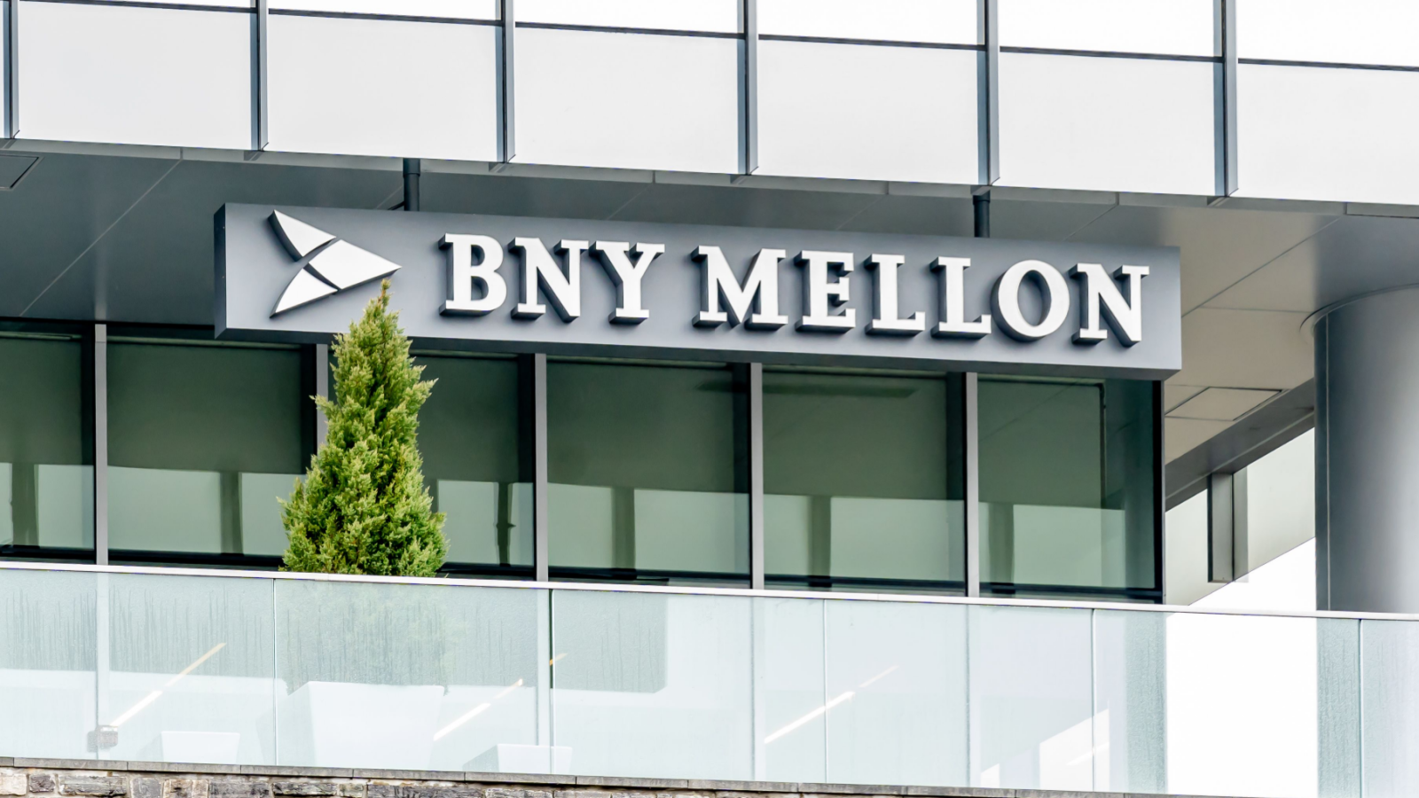 Sign of BNY Mellon Wealth Management. The Bank of New York Mellon Corporation (BK) is an American banking and financial services holding company.