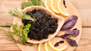 Caviar dish serves with lemons