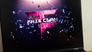 FaZe (FAZE) Clan esports organization logo displayed on laptop computer screen. FAZE went public via a SPAC.