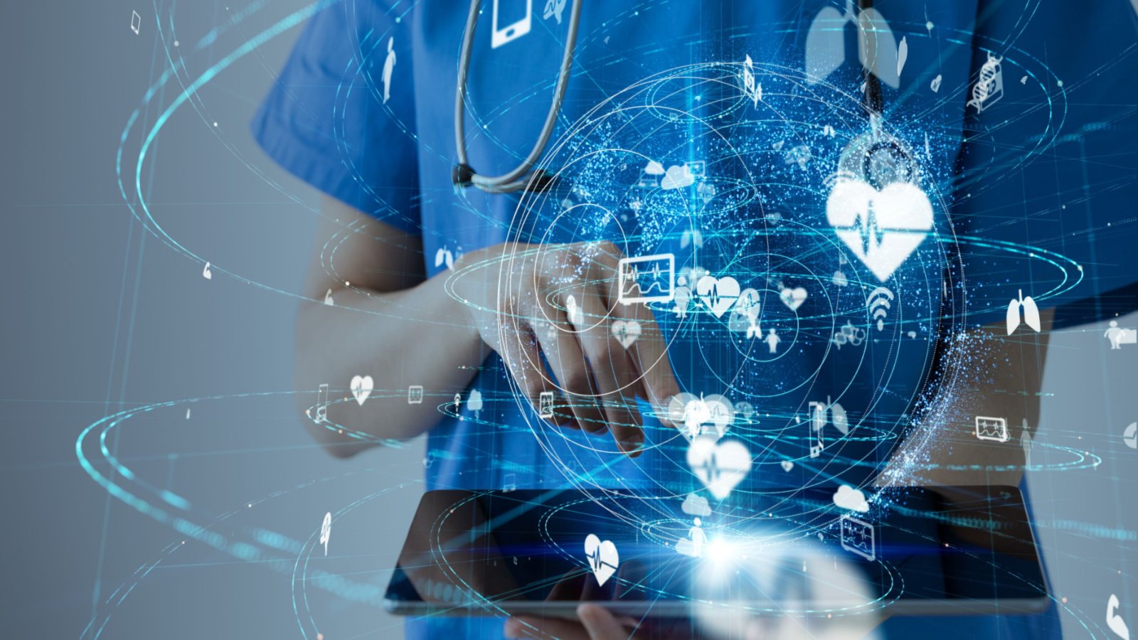 NUTX Stock. Nurse holding a tablet with icons representing different aspects of healthcare and healthcare data representing CANO stock.