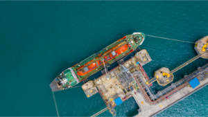 Ship tanker gas LPG, Aerial view Liquefied Petroleum Gas (LPG) tanker, Tanker ship logistic and transportation business oil and gas industry, Loading arm oil and gas offshore platforms.