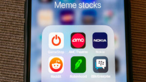 Icons of meme stocks on phone screen. meme stocks.