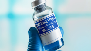 Booster vaccination against smallpox and monkeypox (MPXV).  Doctor with vial of doses of Monkeypox disease vaccine (MPXV).  Geovax (GOVX) has a monkeypox vaccine.