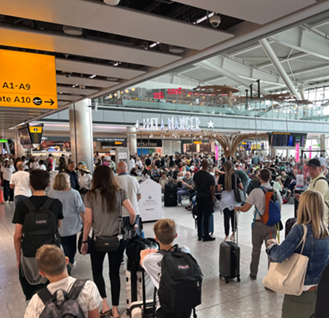 a picture of crowds at London's Heathrow airport