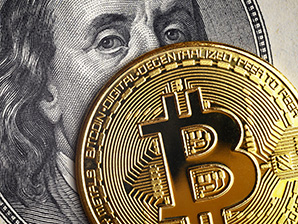 Gold bitcoin on $100 bill