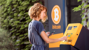 Bitcoin Depot, Woman in front of ATM for Bitcoin.