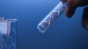 DNA molecule in glass tube in hand of scientist on blue. Invitae does genetic testing. NVTA stock