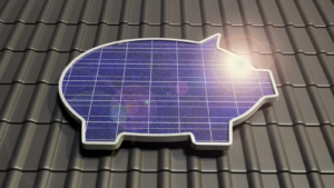 An image of a solar panel in the shape of a piggy bank on a rooftop; concept for solar stocks