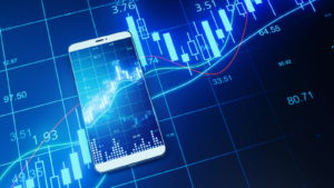 Close up of phone with creative forex chart on blue background. Trade, finance, technology and communication concept. 3D Rendering. Tech Stocks to Buy Before the Bull Market Returns. Tech Stocks to Sell