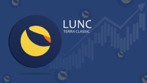 An image of a Terra Classic (LUNA-USD) token on a blue background with a rising arrow. LUNC crypto