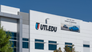 Universal Technical Institute (UTI) logo on the building in Long Beach, CA, USA. UTI is a private for-profit system of technical colleges.